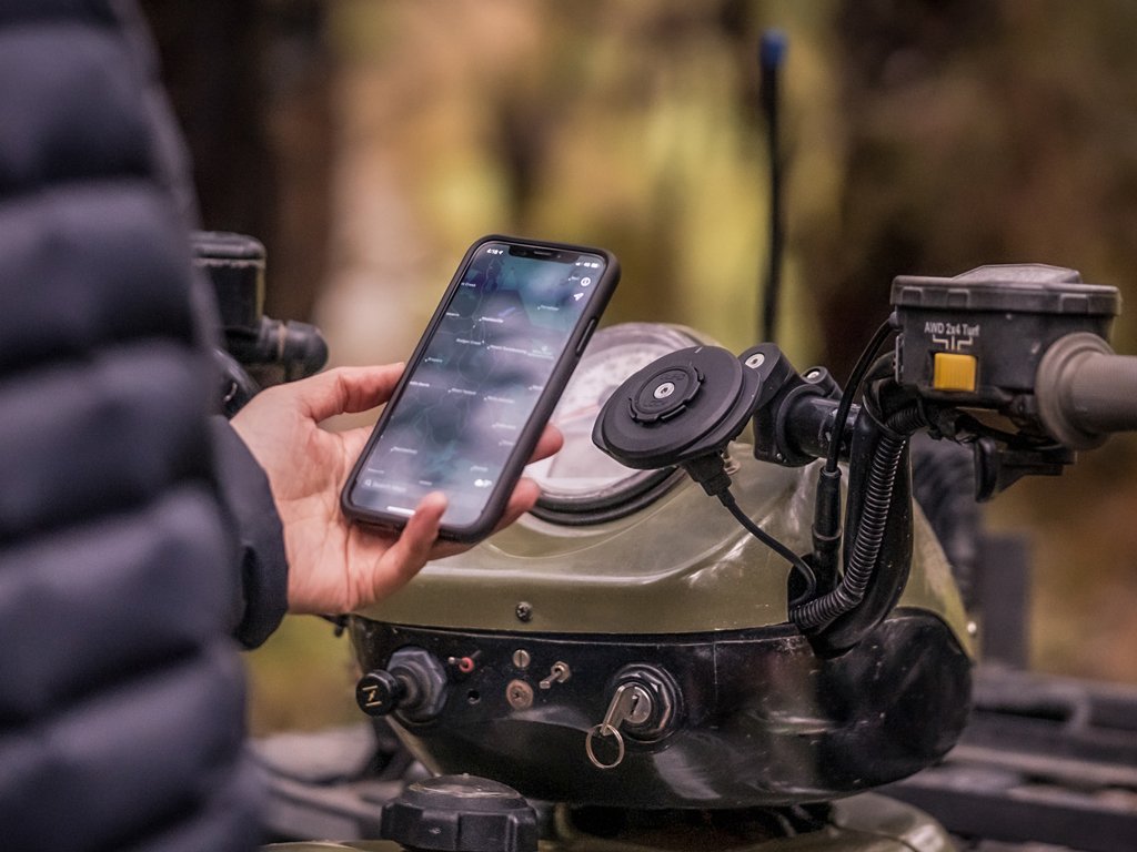 Quad Lock extension arm being used on ATV